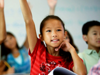 Students raising their hands 
